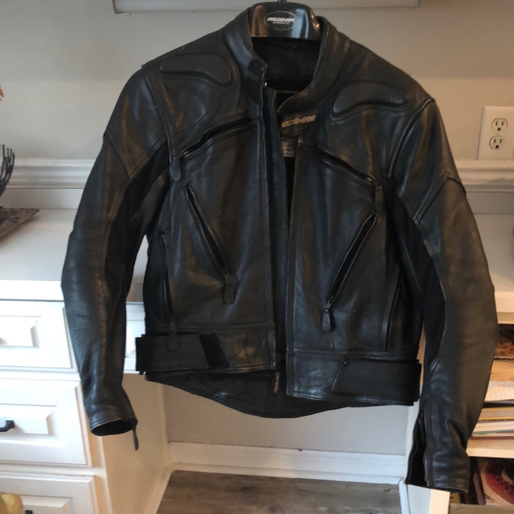 Black Performance Jacket with Reinforced Shoulders and Adjustable Waist